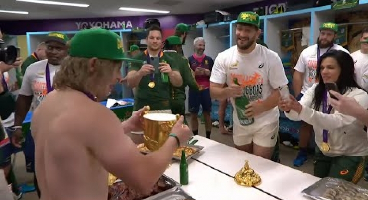 South Africa drink from Webb Ellis Cup to celebrate