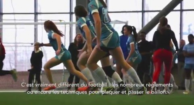 Magali Harvey teaches Montreal football (gridiron) player John Bowman about rugby